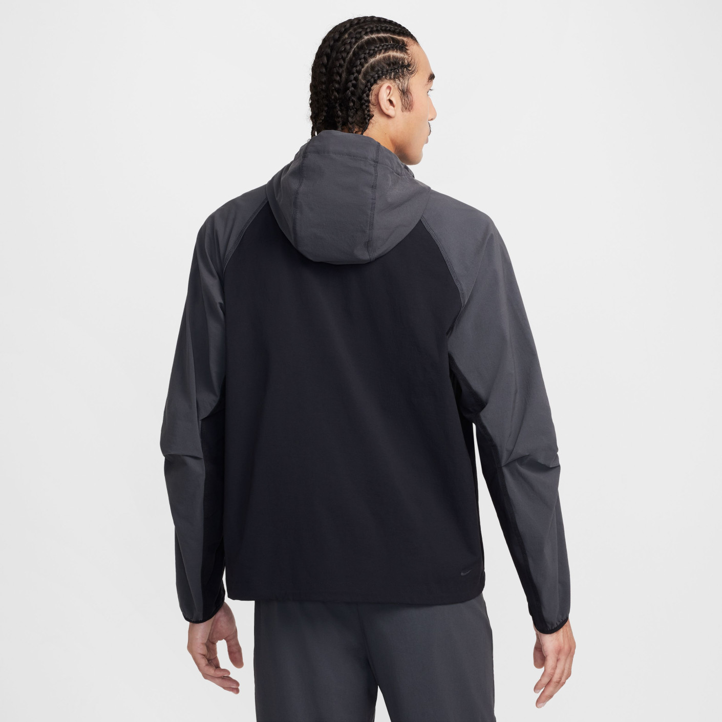 black and gray nike windbreaker