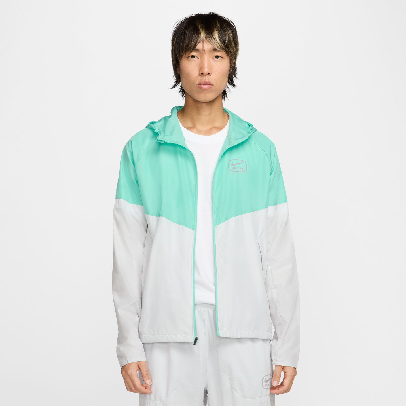turquoise nike windbreaker