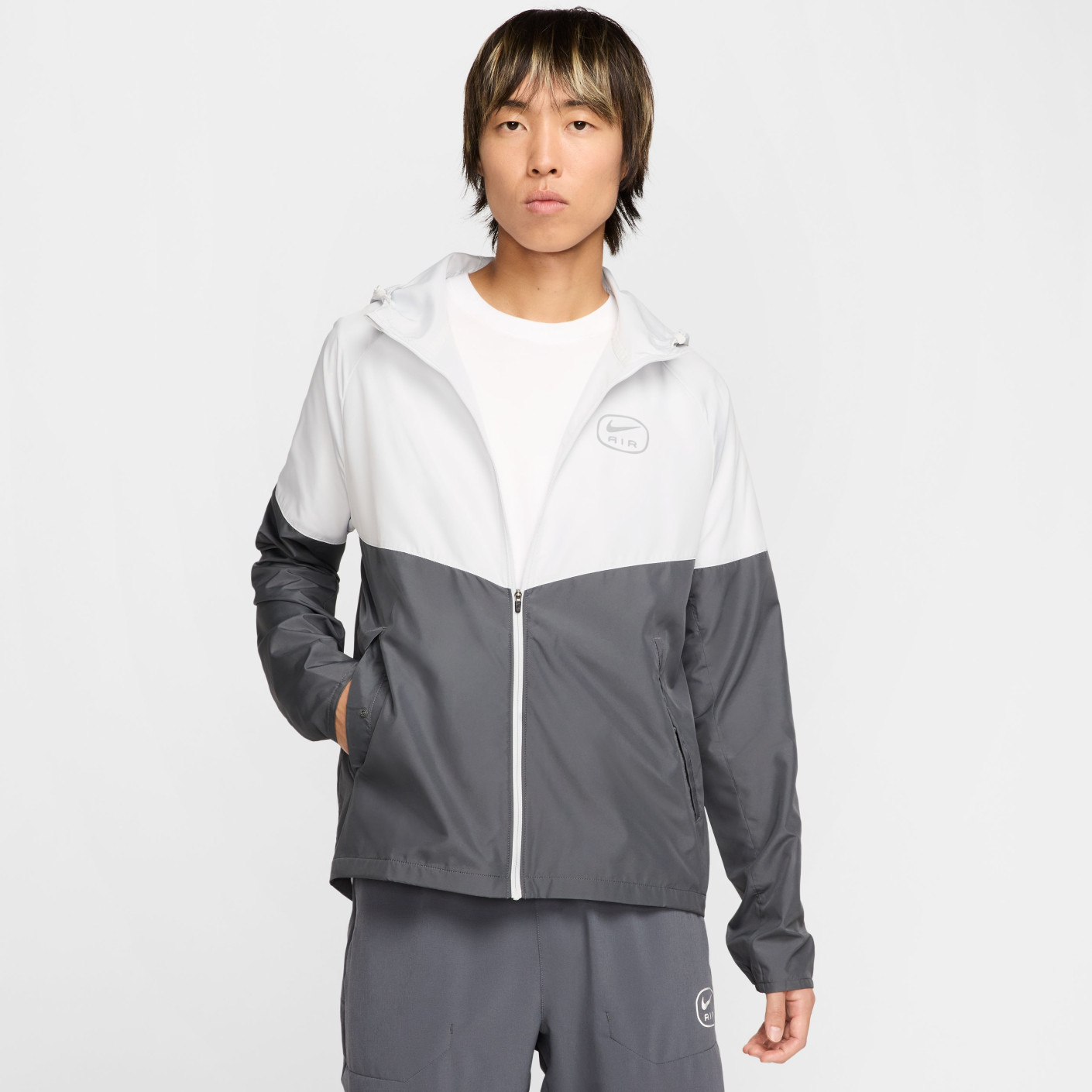 white and grey nike tracksuit
