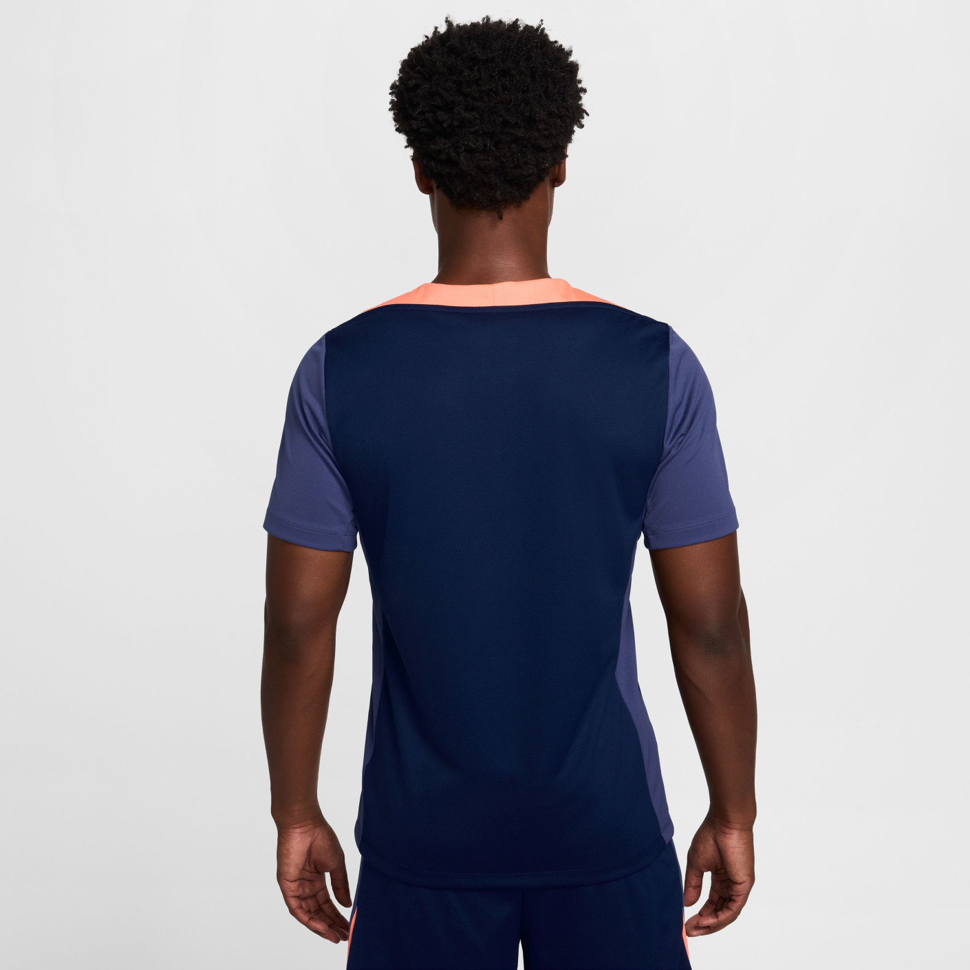 orange and navy blue nike shirt