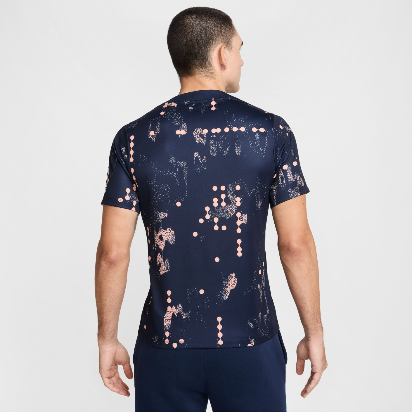 pink blue and yellow nike shirt