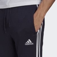 adidas Essentials Fleece Tapered Cuff 3-Stripes Broek Blauw