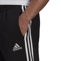 adidas Essentials Fleece Joggingbroek Cuff 3-Stripes Zwart Wit