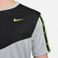 Nike Sportswear Repeat Zomerset Woven Grijs Lichtgeel Zwart