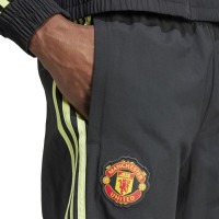 adidas Manchester United Woven Trainingsbroek 2023-2024 Zwart Donkergroen Felgroen
