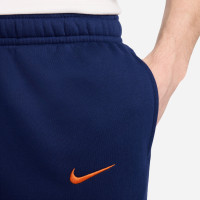 Nike Nederland Sportswear Club Crew Trainingspak 2024-2026 Blauw Oranje