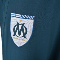 PUMA Olympique Marseille Pre-Match Woven Trainingsbroek 2024-2025 Donkerblauw Lichtblauw Wit