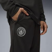 PUMA Manchester City Trainingspak 1/4-Zip 2025-2026 Kids Zwart Zilver