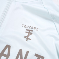Touzani Platinum Bekko Trainingspak 1/4-Zip Kids Lichtblauw Wit