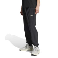 adidas Tech Essential Woven Trainingspak Zwart Zilver