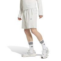 adidas Tech Essential Woven Zomerset Lichtgrijs Zilver