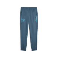 PUMA Manchester City Pumatech Woven Trainingsbroek 2026-2027 Donkerblauw Blauw