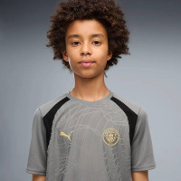 PUMA Manchester City Trainingsshirt 2026-2027 Kids Donkergrijs Zwart Goudgeel